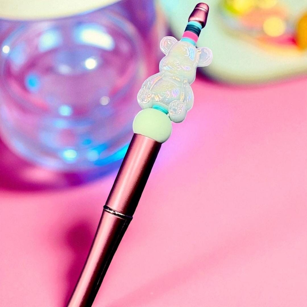 Charming Gummy Bear-themed black ballpoint pen. Cute and colourful writing accessory. Perfect gift