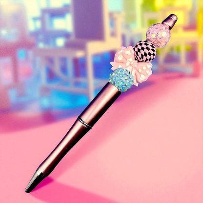 black ballpoint pen with colourful bead accents. stationery lovers Leopard print hearts and bows.