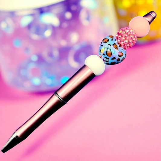 black ballpoint pen with colourful bead accents. stationery lovers Leopard print hearts and bows.