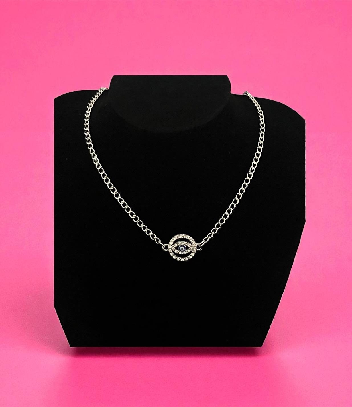 Circular diamanté evil eye centred necklace- colour silver