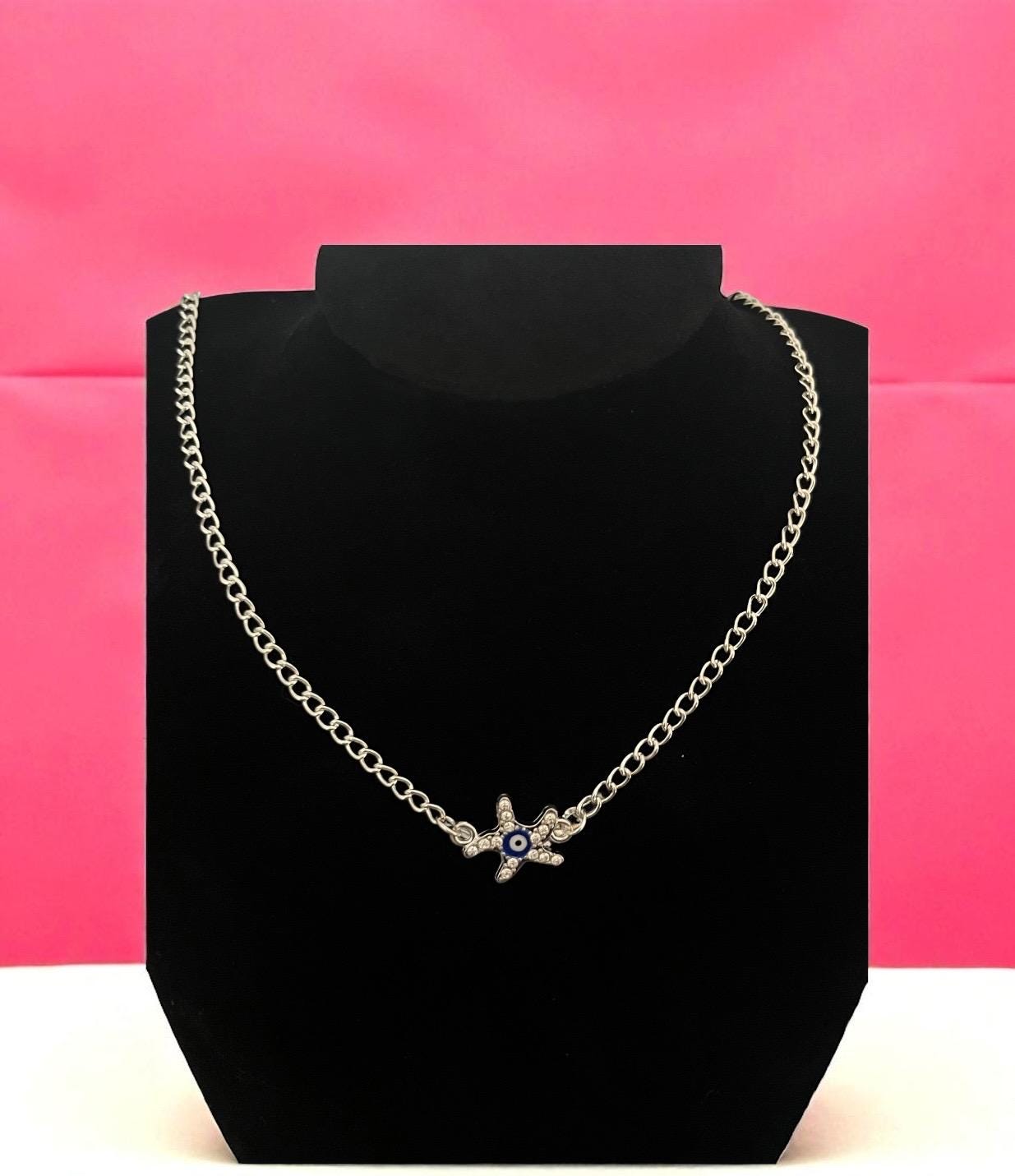 Starfish evil eye necklace- colour silver