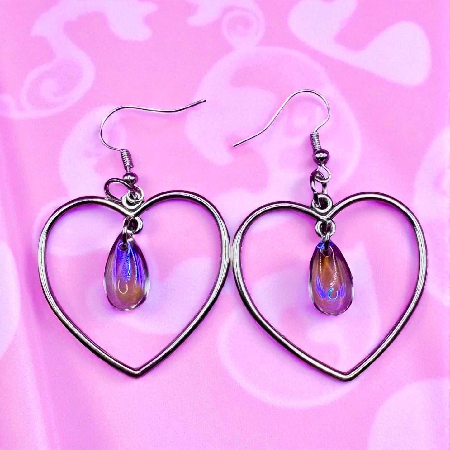 Heart hoop style dangly earrings- colour silver