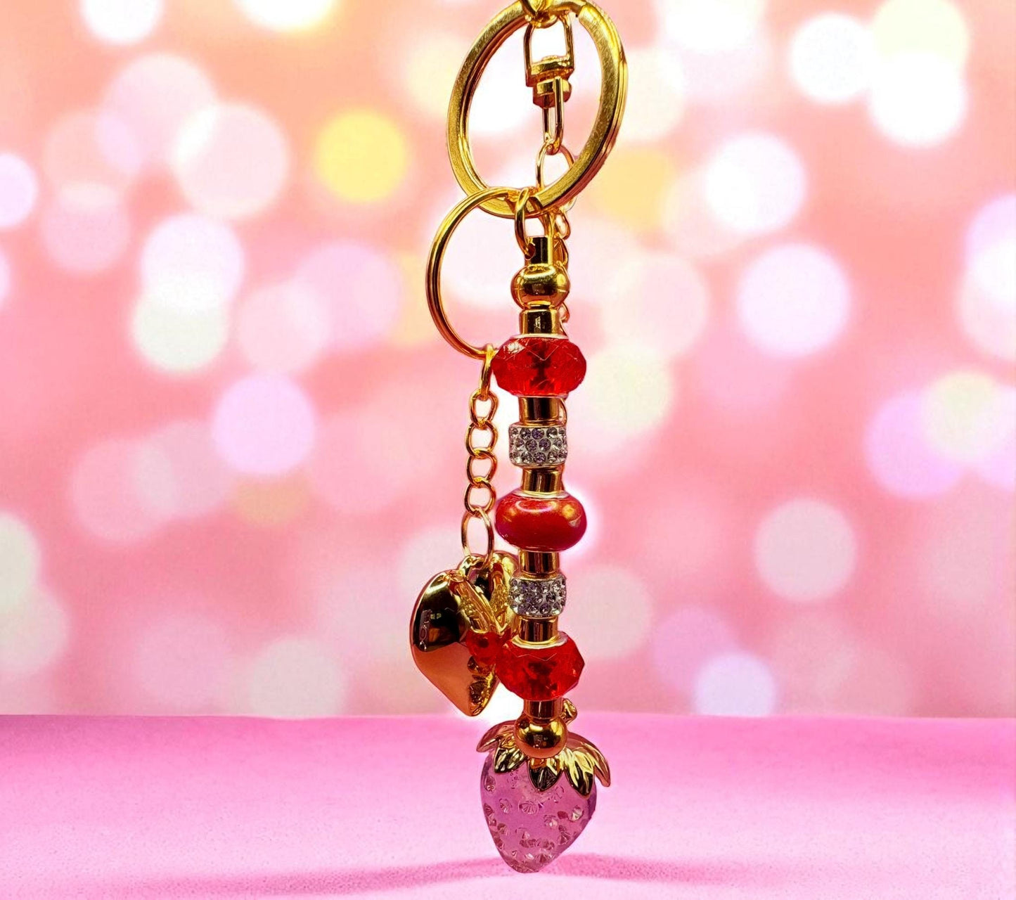beaded keyring bag charm heart pendant and strawberry pendant red beads standout sparkly bead heart