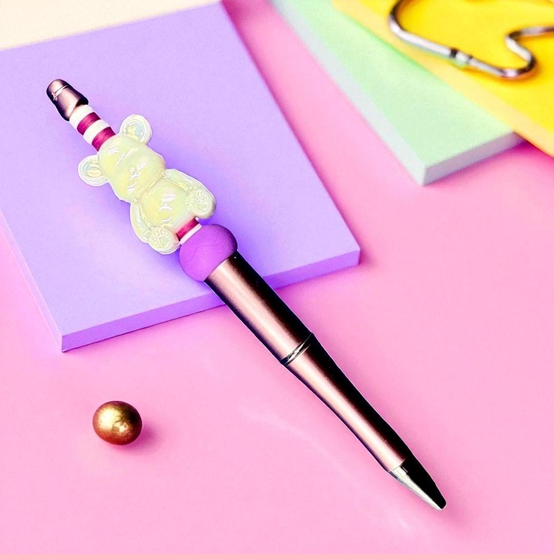 Charming Gummy Bear-themed black ballpoint pen. Cute and colourful writing accessory. Perfect gift