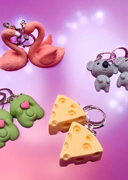 Novelty earrings, dangly drop earrings. Choose from Cheese koala flamingo frog. Resin cartoon style. costume jewellery earrings