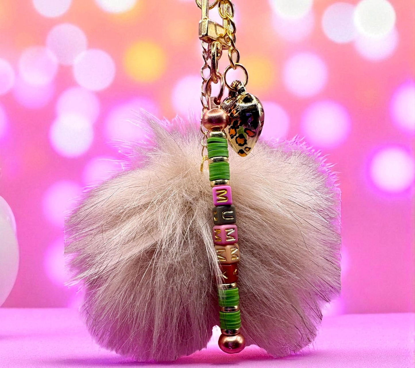 bag charm keychain mummy beads with gold leopard print heart pendant and fluffy ball